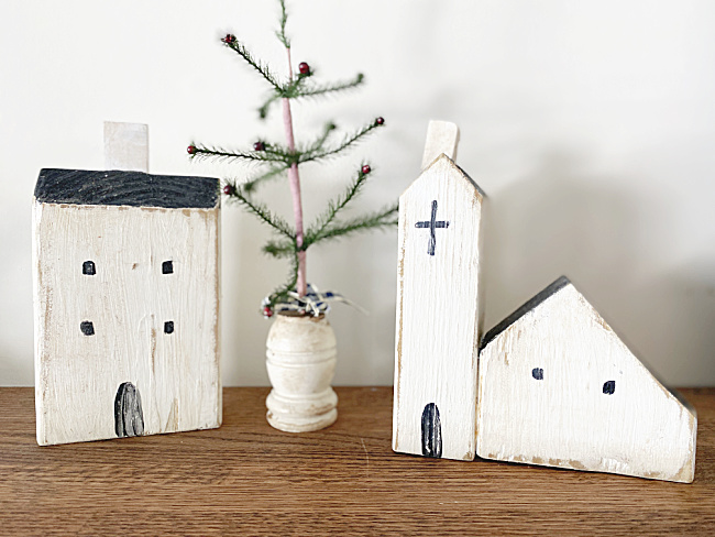 wooden houses and a Christmas tree