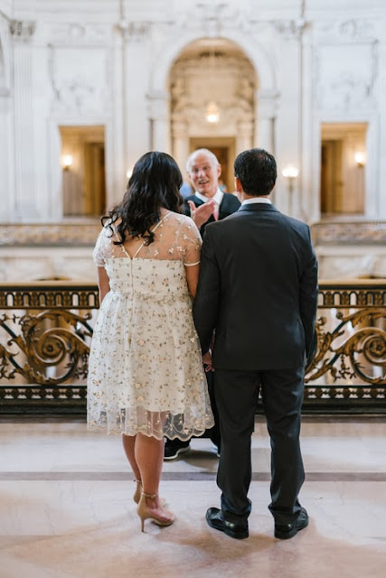 couple saying vows in church