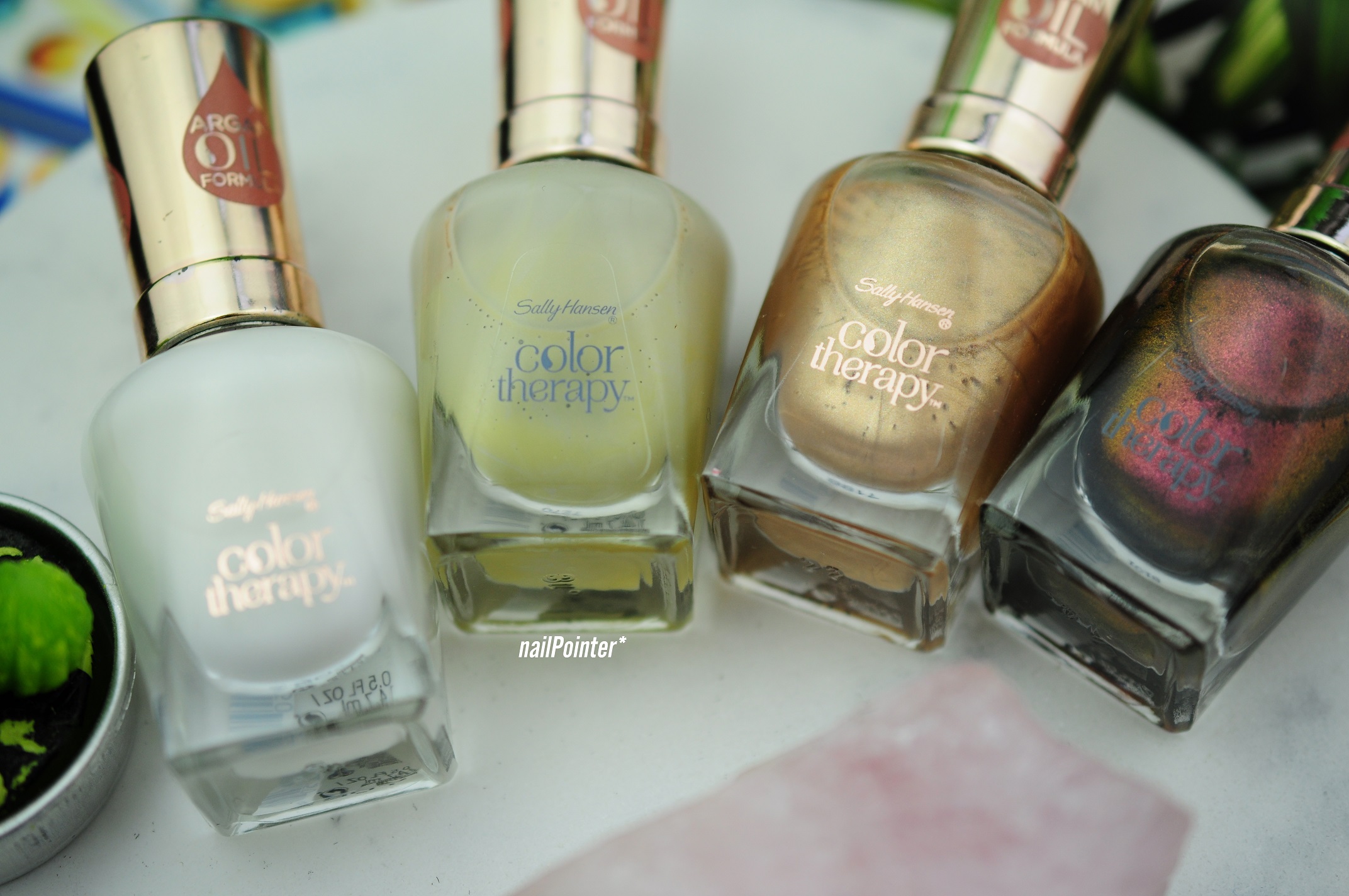 SWATCHES Sally Hansen Color Therapy Well Well Well, Make My Clay, Glow What Fun & Bronze Reflection