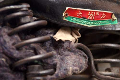 Close-up image of a bicycle seat, in China, seat manufactured by Suong Zong Dalian Zuo Chang.