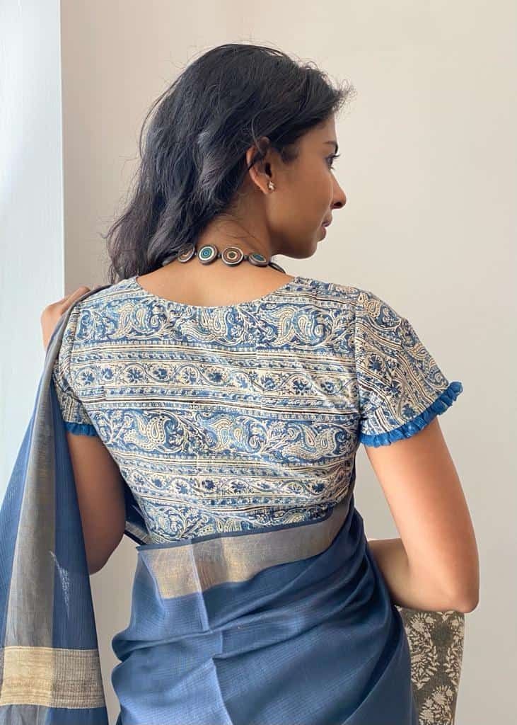 #12 Simple cotton saree blouse with tiny sleeve frill detailing.