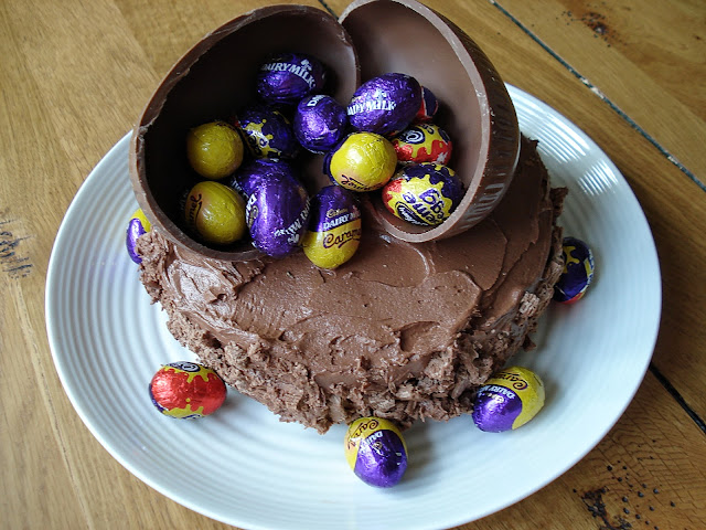 Gluten free vegan chocolate cake decorated with mini creme eggs