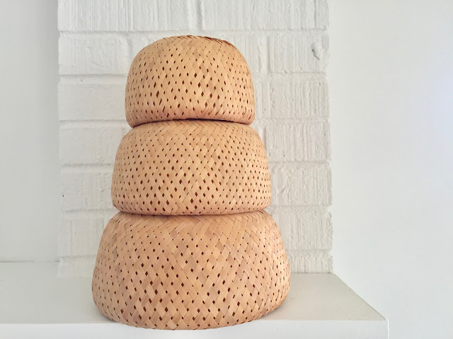 trio of vintage woven round nesting baskets