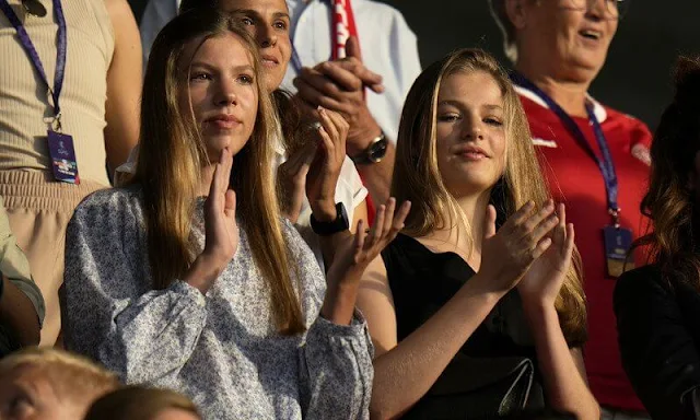 Princess Leonor wore a black v-neck top by ONLY. Infanta Sofia wore a new printed cotton and silk blouse by & Other Stories