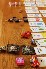 Use leftover Halloween candy as an easy letter recognition activity for preschoolers