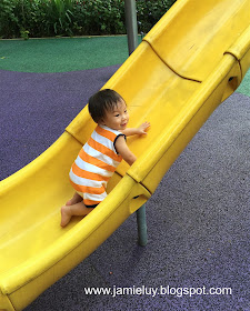 Baby in Carters at the Slide