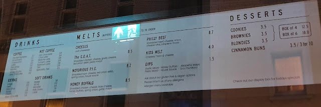 Melted grilled sandwich shop opening menu - drinks, melts an desserts which are like Subway cookies on steroids