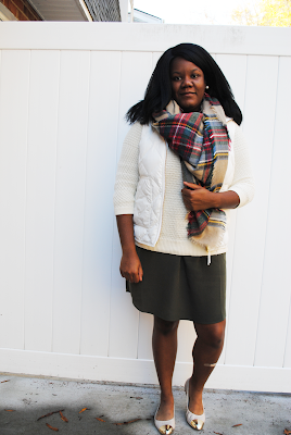 An outfit inspiration post featuring a J. Crew Factory puffer vest, plaid blanket scarf and cream flats.