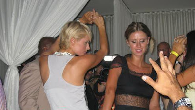 Paris Hilton and Nicky Hilton Dancing in Nightclub