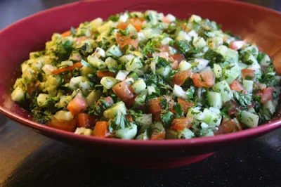 Chopped tomato cucumber onion with verjuice