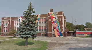 A quilt covering basement of Cook Elementary School.