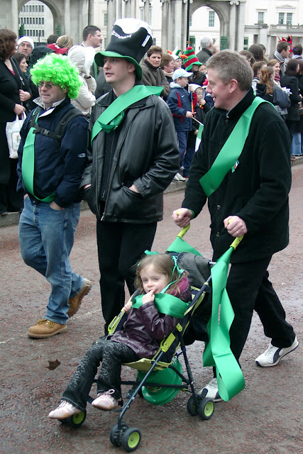 Green stroller, Saint Patrick's Day parade, South Carriage Drive, Hyde Park, London