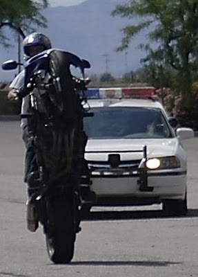 motorcycle wheelies report