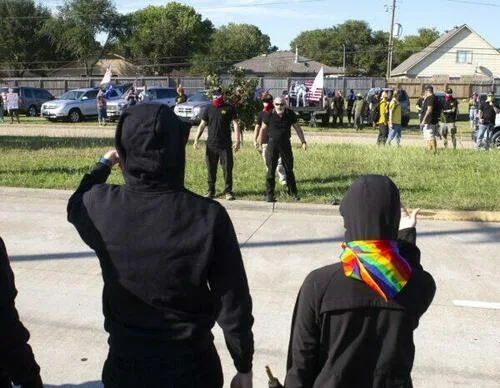 Proud Boys and Antifa face off at a drag bingo fundraiser at First Christian Church in Katy, Texas, on Sept. 24, 2022.