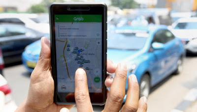 Taksi Online GrabCar di Bandara Soetta Dibolehkan