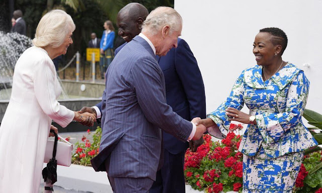 Queen Camilla wore a white dress and diamond brooch. President William Ruto and First Lady Rachel Ruto