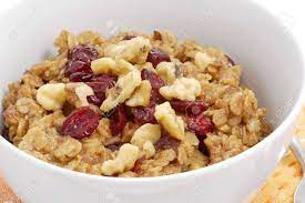 bowl of oatmeal and dry fruits
