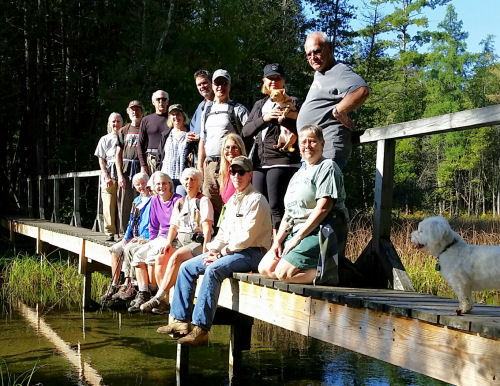 hiking group on a bridge