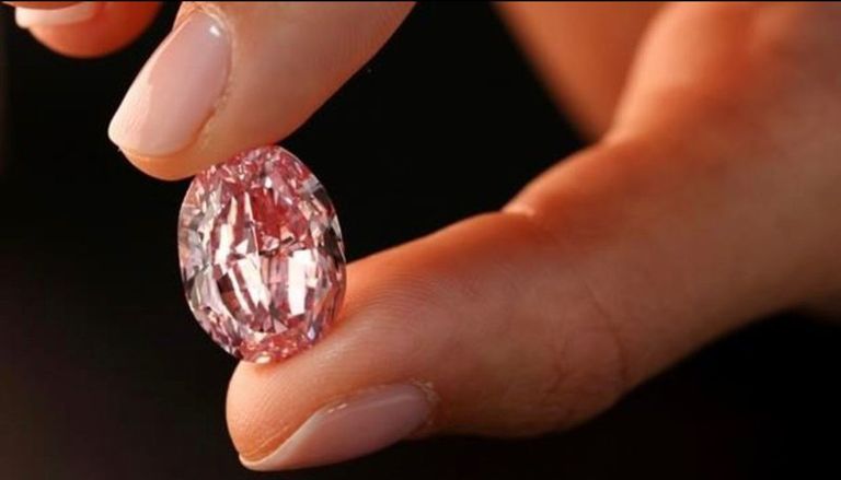 The largest pink diamond for sale.. its price reaches 35 million dollars Christie's has announced that a giant pink diamond, an extremely rare gem, will be auctioned in Geneva in November and could fetch up to $35 million.  This 18-carat gem is the largest pear-shaped pink diamond of this quality ever to be auctioned, according to Christie's.  The diamond, which will be auctioned for the first time on November 8, has been valued at between $25 million and $35 million.  The diamond is set on a ring, flanked on both sides by a large white diamond.  This diamond weighs exactly 18.18 carats, a number that bears positive connotations, according to Christie's.  "Its decent weight of 18.18 carats (...) actually brings good luck to the new owner," Christie's expert Angela Bearden told AFP.  "Beautiful stone, it is very rare to find a pink diamond, a light pink diamond, of this size, and I don't know where to find another similar diamond," she added.  The "Fortune Pink" is the largest bright pink pear-shaped diamond ever to be auctioned, but other larger cushion-shaped diamonds have been sold.  In 2018, Christie's sold a stunning 18.96-carat pink "legacy" pink diamond for more than 50 million Swiss francs, or $49.9 million at the time, a record price per carat for a stone of this color.  This emerald-cut diamond, discovered about a century ago in South Africa, was purchased by the American jewelry company Harry Winston, a subsidiary of the Swiss watch group Swatch, which promptly renamed it Winston Pink Legacy.  The year before, the "Raj Pink", the world's largest 37.3-carat dense pink diamond auctioned by Sotheby's, could not find a buyer.  Its value was estimated at up to $30 million.