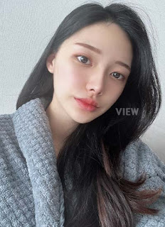 front view of a Korean woman who had rhinoplasty