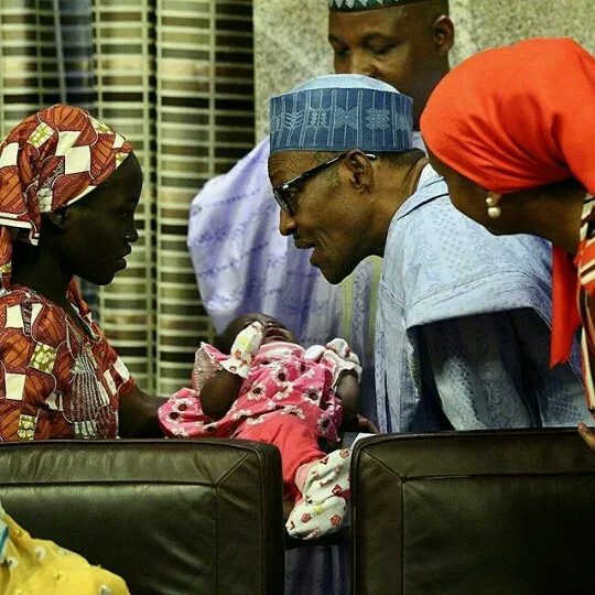 Amina Ali the Chibok girl found visits President Buhari with her baby