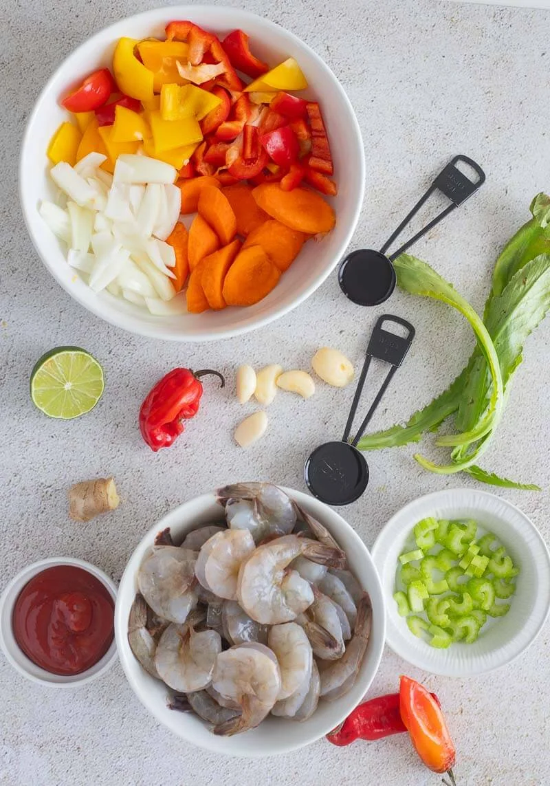 The ingredients needed to make Trinidad pepper shrimp all portioned out.