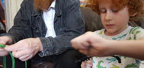 7 year old making paracord survival wristbands