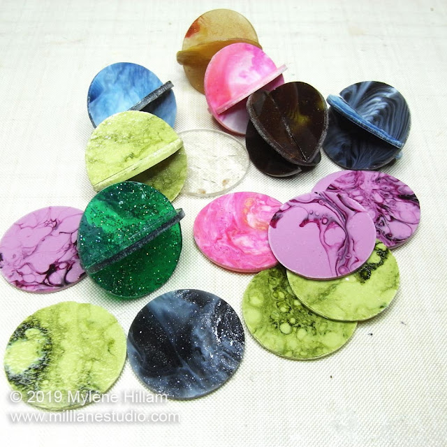 Multi coloured resin orb beads and disks