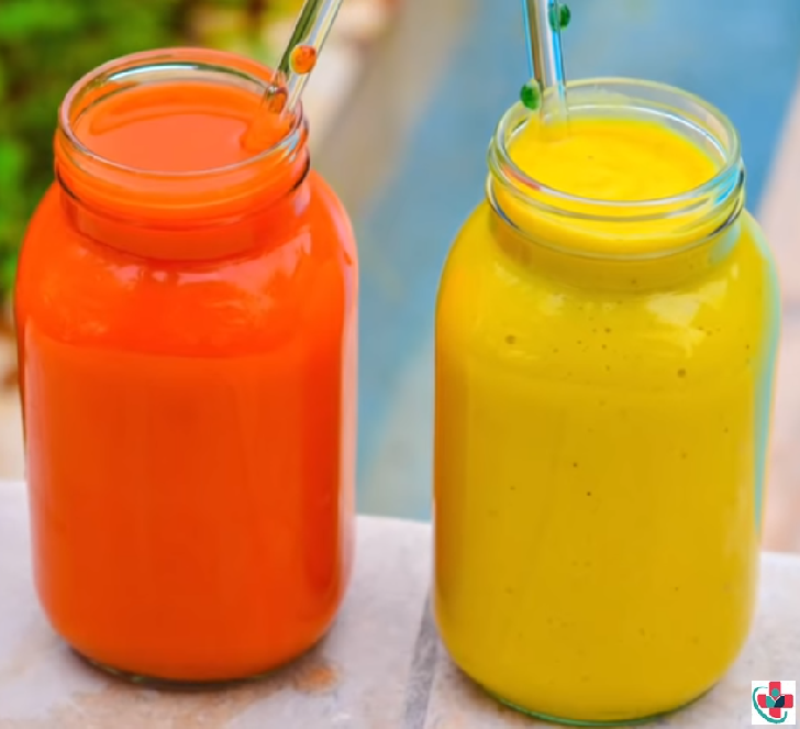 A jar full of a juice and a smoothie