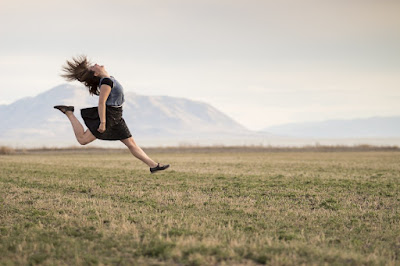 image: https://pixabay.com/photos/girl-jumping-happy-smiling-field-925410/