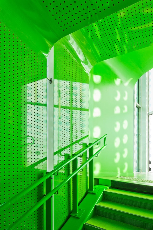 Close up photo of green painted staircase