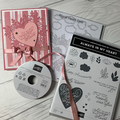 Stamps dies and ribbon used to create this striped Valentines card using hearts from Floral Heat Dies