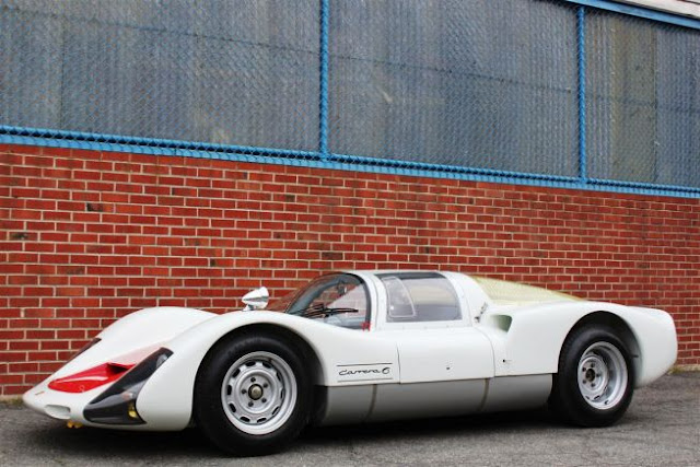 1966 Porsche 906 Carrera Competition Coupe ( 1966 PORSCHE 906 CARRERA COMPETITION COUPE Price $900,000-$1.1 million)  Despite its seemingly meek 220bhp, 2-liter flat-six cylinder engine, this car — commonly referred to at the time as the Porsche Carrera 6 .1966 PORSCHE 906 CARRERA COMPETITION COUPE  offers up a top speed of nearly 170 mph, an original multi-tubular chassis frame, and a new FIA-approved roll cage.