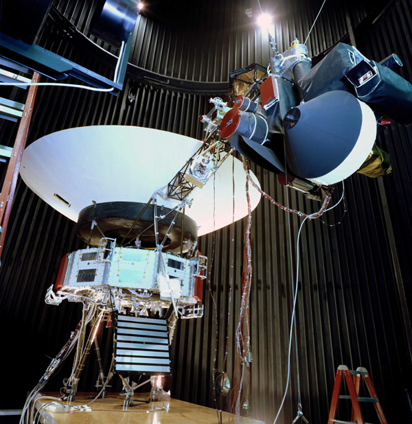 A 1976 photo of a full-scale test article of NASA's Voyager probe inside a space simulator chamber at the Jet Propulsion Laboratory in La Cañada Flintridge, California.