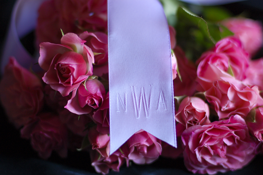 A subtle romantic custom touch on the pew bows