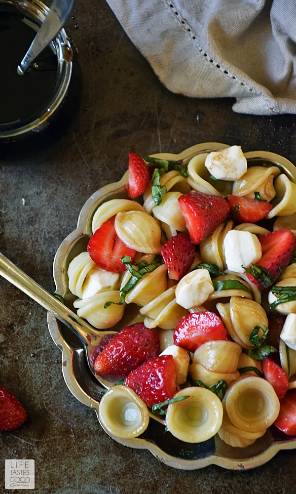 Strawberry Caprese Pasta Salad | by Life Tastes Good is a twist on the traditional Caprese Salad. Instead of tomatoes, I used sweet Florida strawberries for a refreshing change to this classic flavor combo! #SundaySupper #FLStrawberry