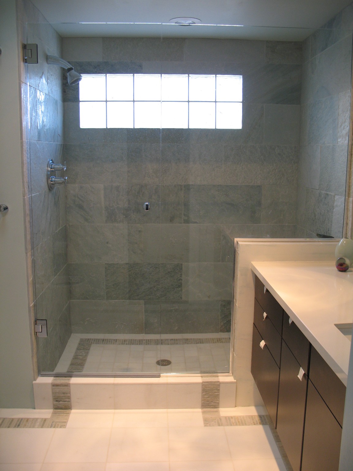 bath tile ideas  tile but what do you think about that border running over the shower