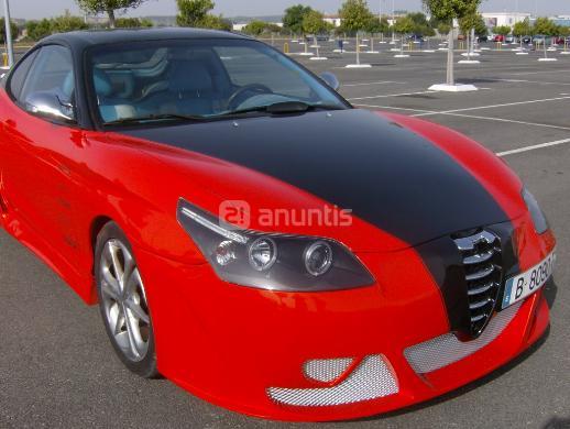 MIRA QUE HYUNDAI COUPE CON LOS FAROS DEL C4 Y EL MORRO DEL ALFA ROMEO