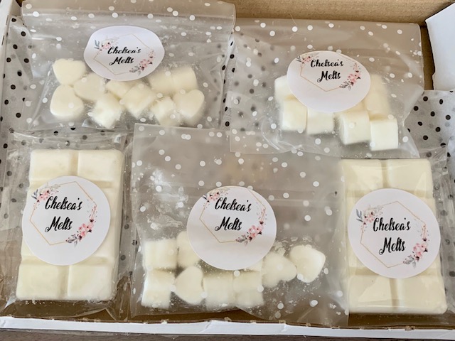 Wax melts in the shape of hearts and snap bar
