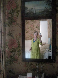 Self portrait in bedroom mirror.