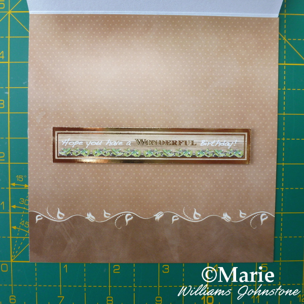 Inside of decorated square easel card with greeting stuck on with 3d foam pads