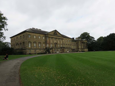 large neoclassical stone house