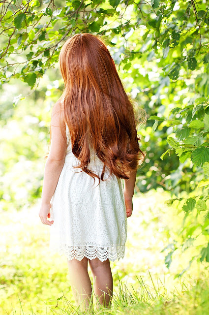 red haired girl shiny hair