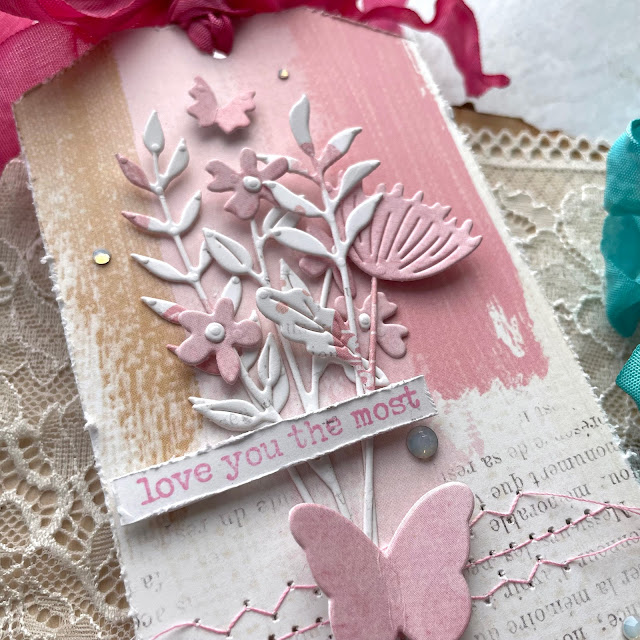Monochromatic Floral Tag Trio created with: Spellbinders floral reflection sealed wildflowers die, color my world butterfly burst die, opal gems; 49 and Market spectrum sherbet paper; Tim Holtz crinkle ribbon, distress oxide ink, distress spray stain, distress mica spray; Scrapbook.com best day ever wordfetti stamp, foam adhesive