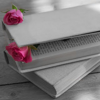 pink roses in a book