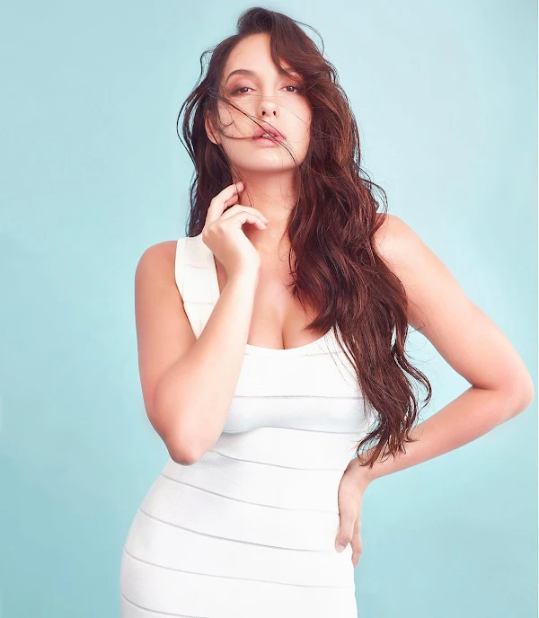 nora fatehi cleavage white dress busty actress dancer