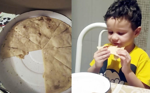 Menino autista comendo pizza