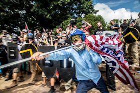 William Fears battling protesters during the Charlottesville rally in 2017. Credit Mark Peterson/Redux