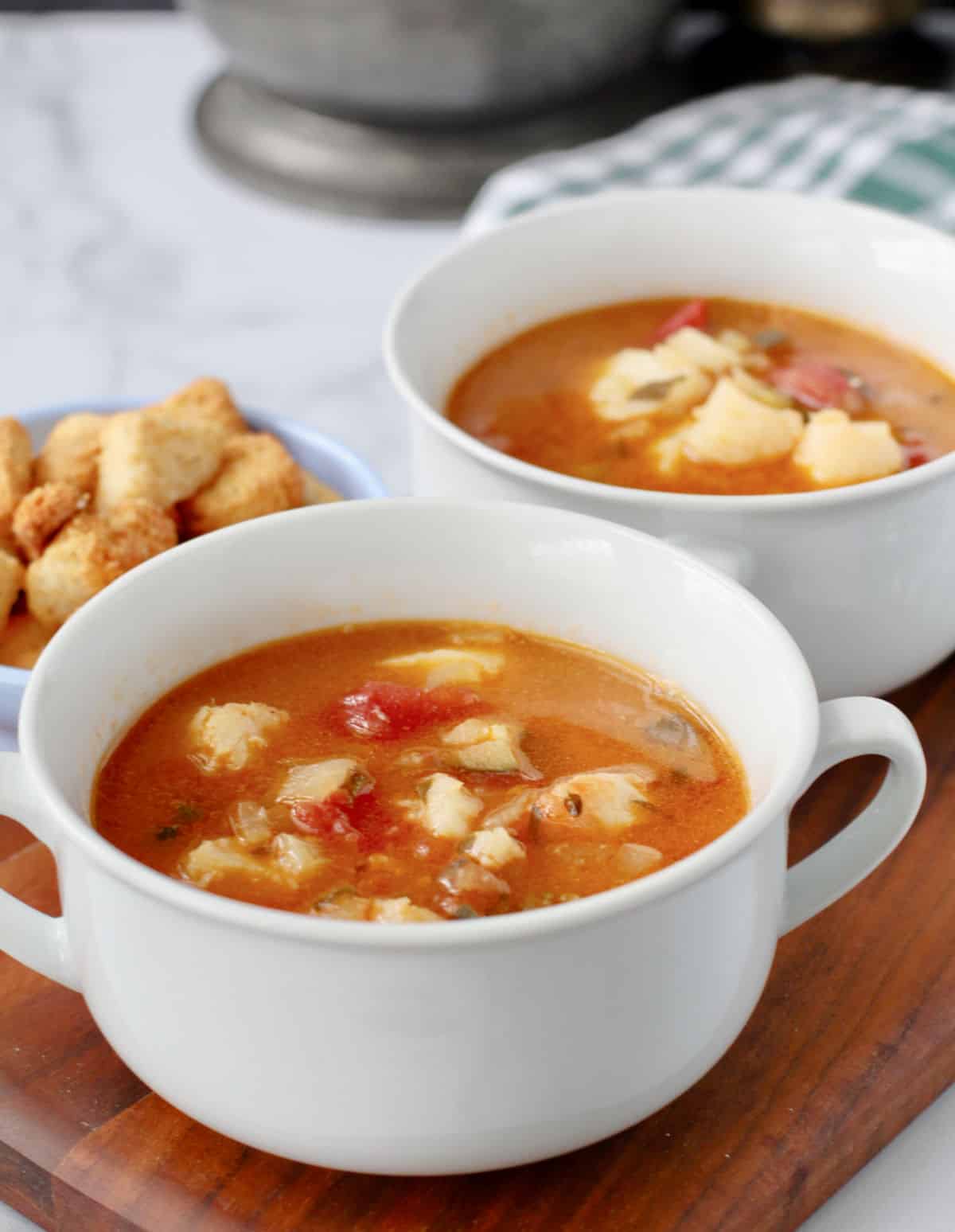 Irish Cod Soup in small white bowls.