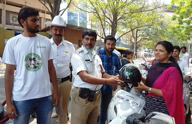 Traffic Police Giving away the helmets